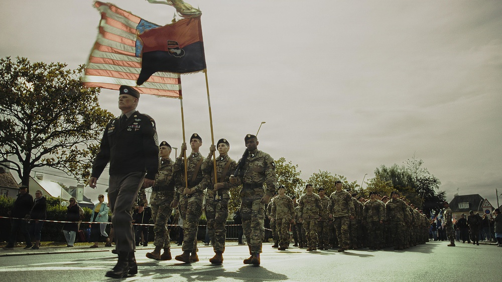 U.S. Army 101st Airborne Division soldiers march in ceremonial parade, Normandy, France