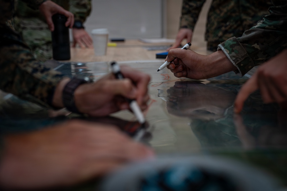 U.S. Marines participate in an integrated staff planners' course with NATO partners, allies in Romania
