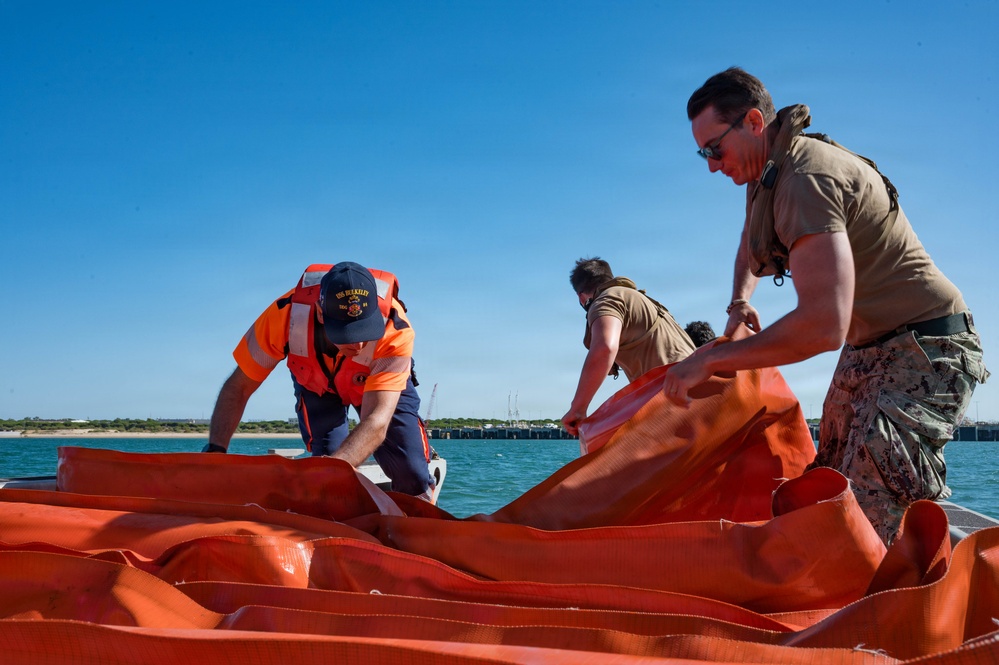 Spanish Armada and U.S. Navy personnel participate in a bilateral oil spill response exercise