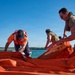 Spanish Armada and U.S. Navy personnel participate in a bilateral oil spill response exercise