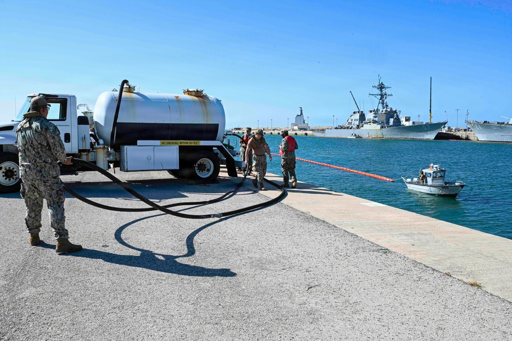 Spanish Armada and U.S. Navy personnel participate in a bilateral oil spill response exercise