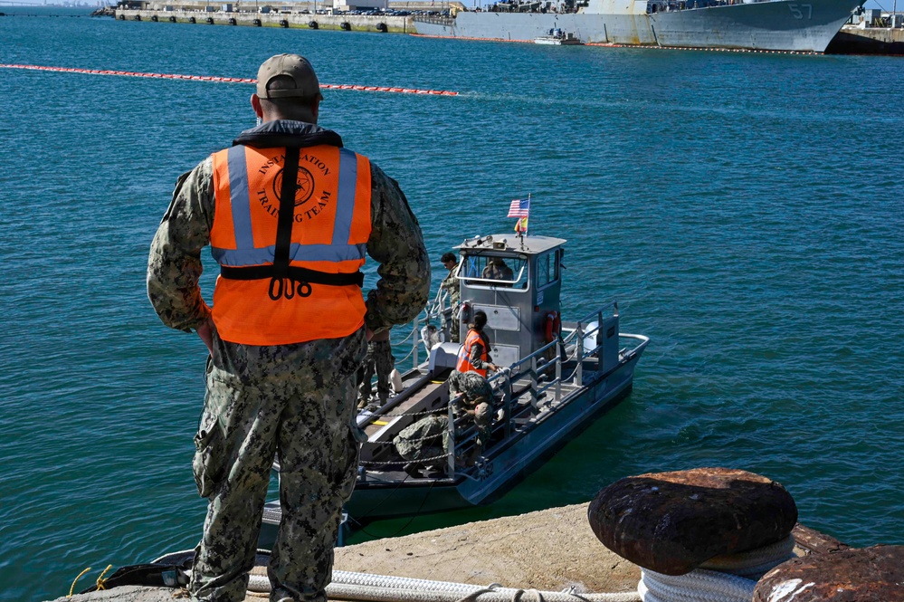 Spanish Armada and U.S. Navy personnel participate in a bilateral oil spill response exercise