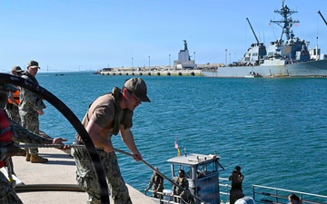 Spanish Armada and U.S. Navy personnel participate in a bilateral oil spill response exercise