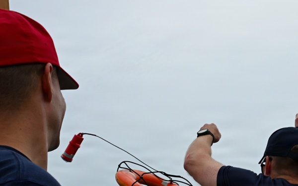 Coast Guard Cutter Eagle crew members conduct man-overboard drills