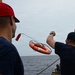 Coast Guard Cutter Eagle crew members conduct man-overboard drills