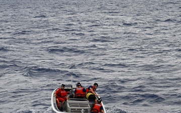 Coast Guard Cutter Eagle crew members conduct man-overboard drills