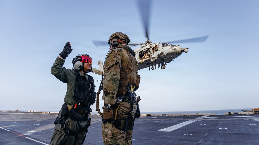 31st MEU | Sailor reenlists on the flight deck