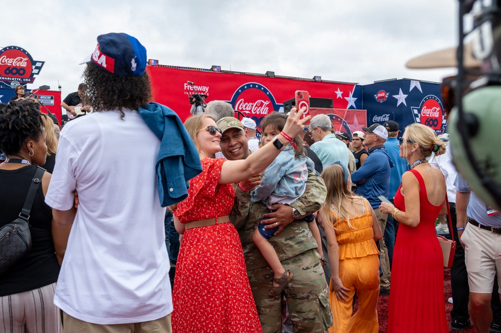 U.S. service members participate in NASCAR's Coca-Cola 600 military appreciation show