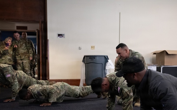 JTF Soldiers challenge deputy U.S. Marshal to a push-up challenge