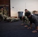 JTF Soldiers challenge deputy U.S. Marshal to a push-up challenge