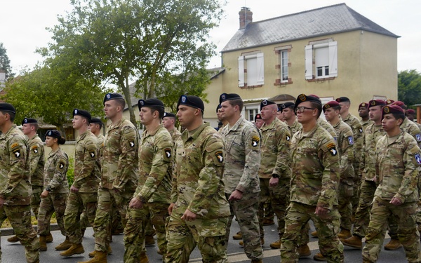 Screaming Eagles March Through Carentan, Commemorate Historical D-Day Battles