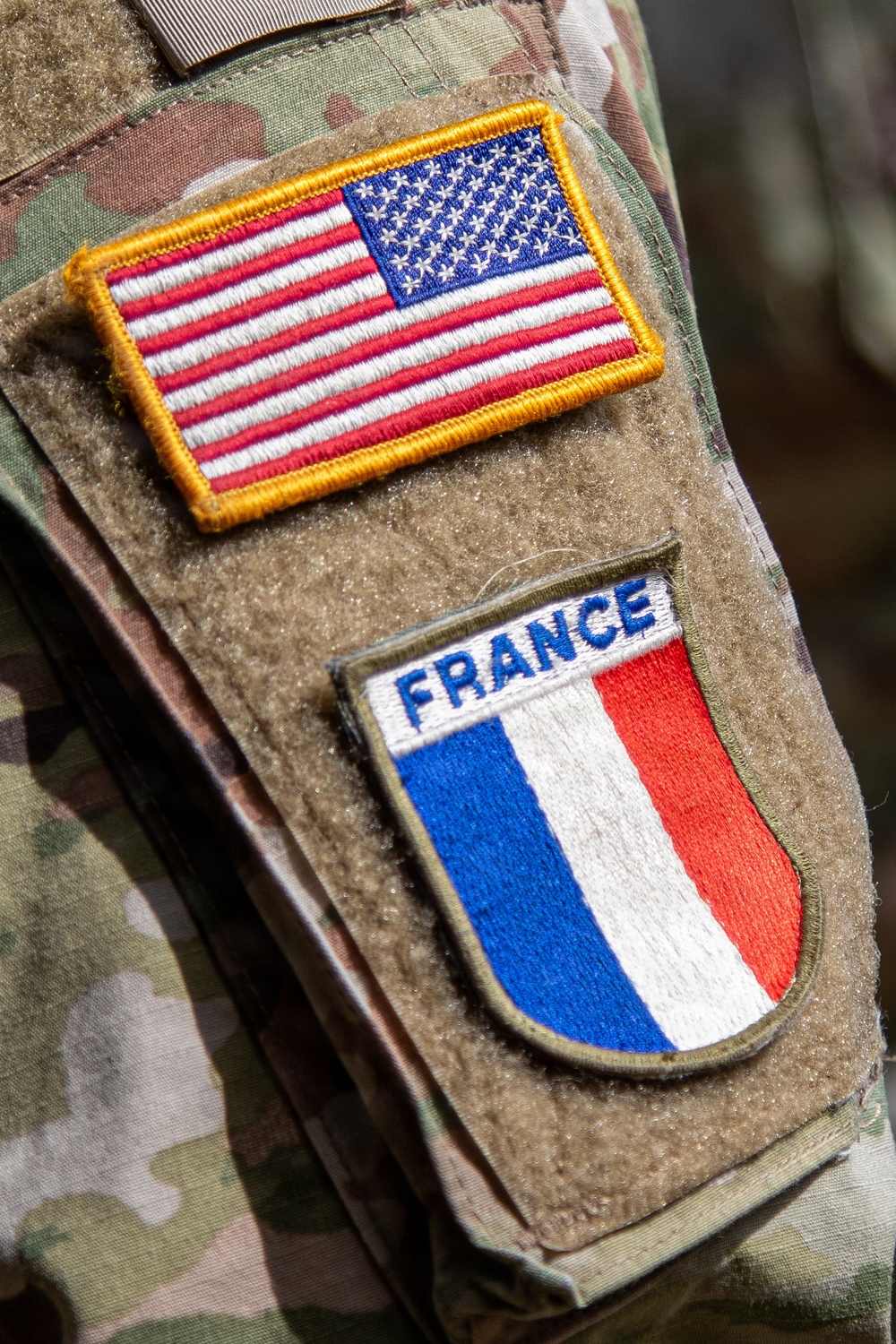 US Soldier shows off newly acquired France patch at D-Day 82 commemoration