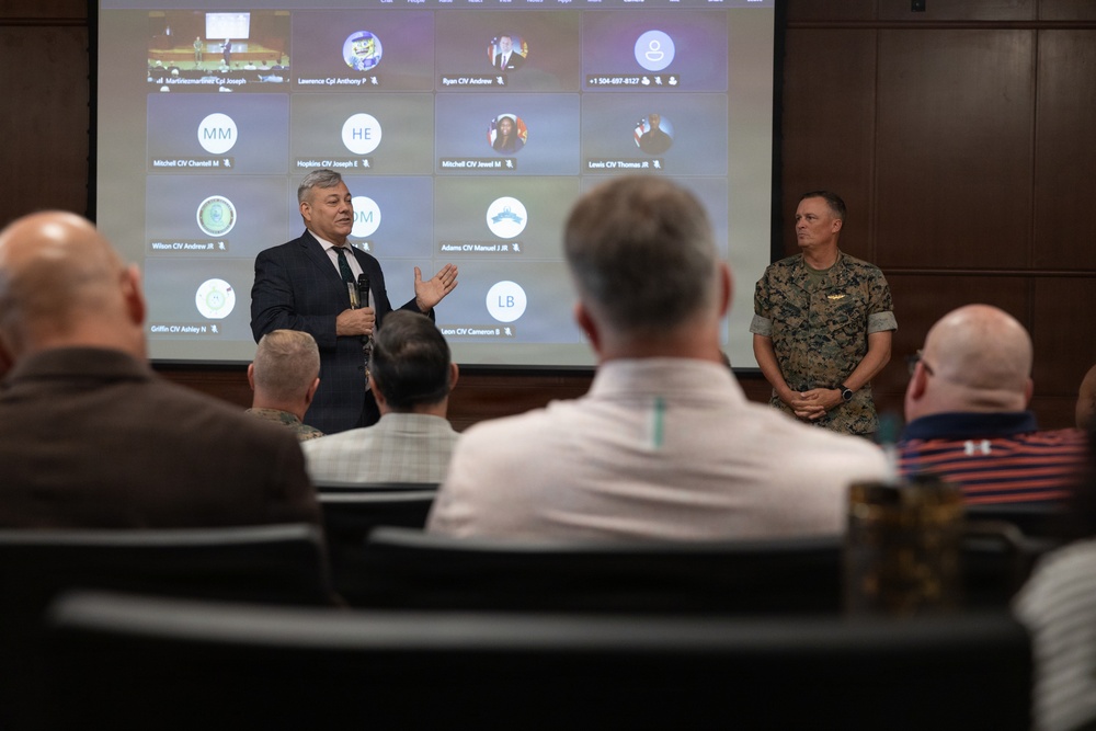 Lt. Gen. Leonard F. Anderson IV presents awards to civilians with Marine Corps Support Facility New Orleans