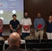 Lt. Gen. Leonard F. Anderson IV presents awards to civilians with Marine Corps Support Facility New Orleans