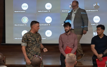 Lt. Gen. Leonard F. Anderson IV presents awards to civilians with Marine Corps Support Facility New Orleans