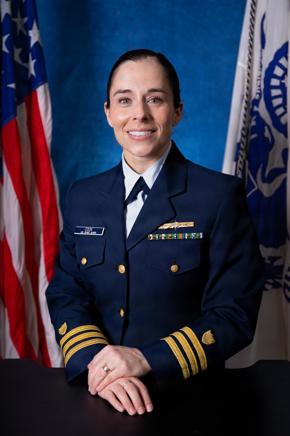 U.S. Coast Guard Commander Lindsay Cook of the U.S. Coast Guard Northwest District poses for an official photo