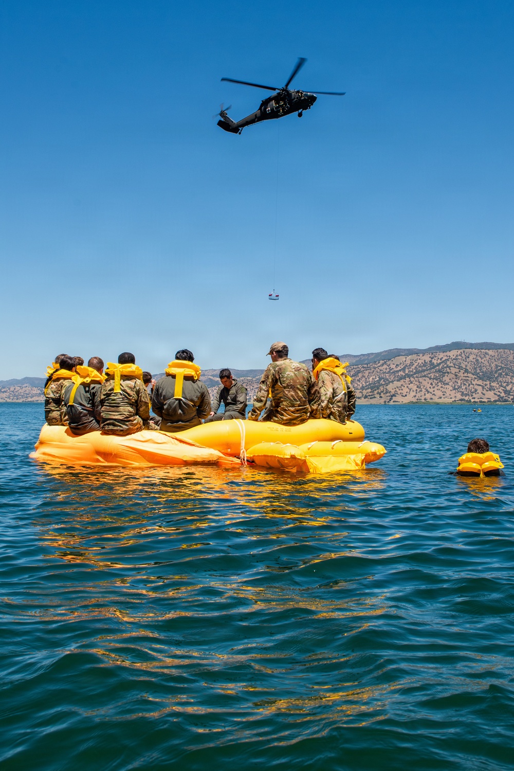 Travis Airmen complete water survival training at Lake Berryessa