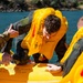 Travis Airmen complete water survival training at Lake Berryessa