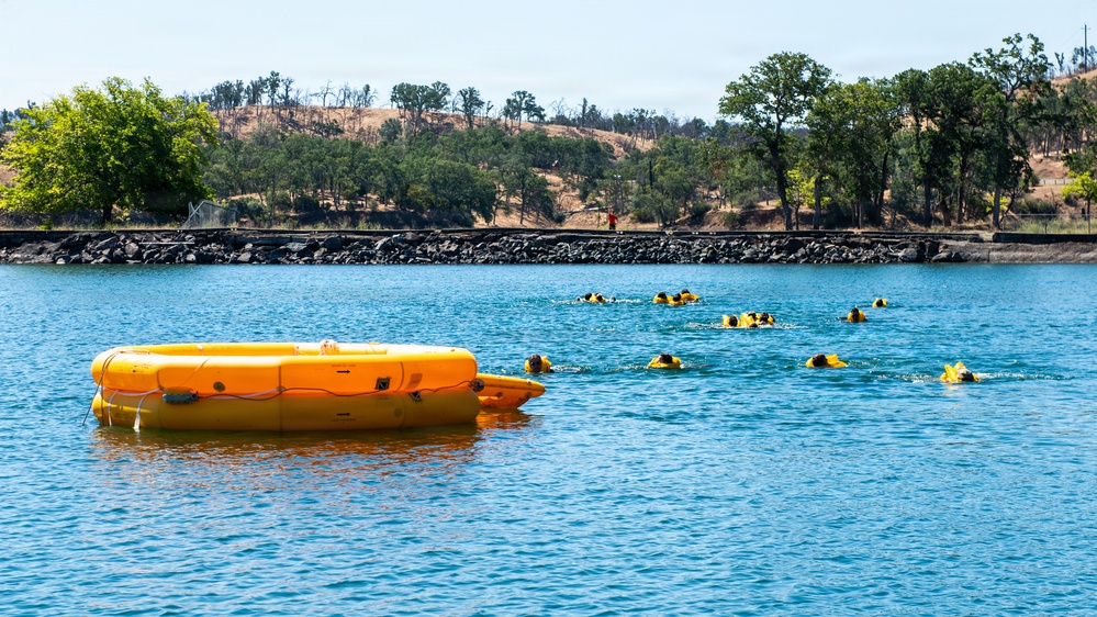 Travis Airmen complete water survival training at Lake Berryessa