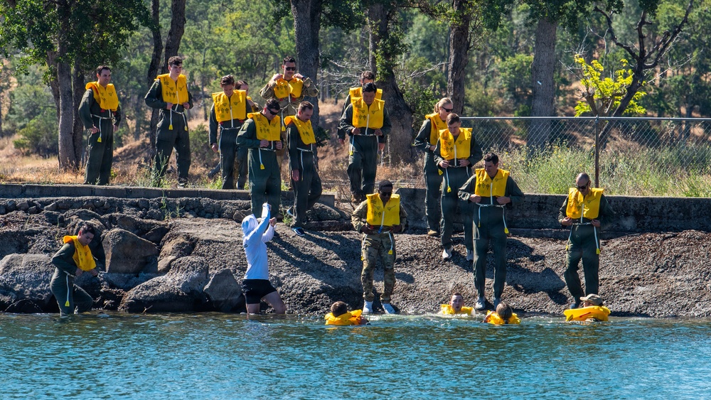 Travis Airmen complete water survival training at Lake Berryessa