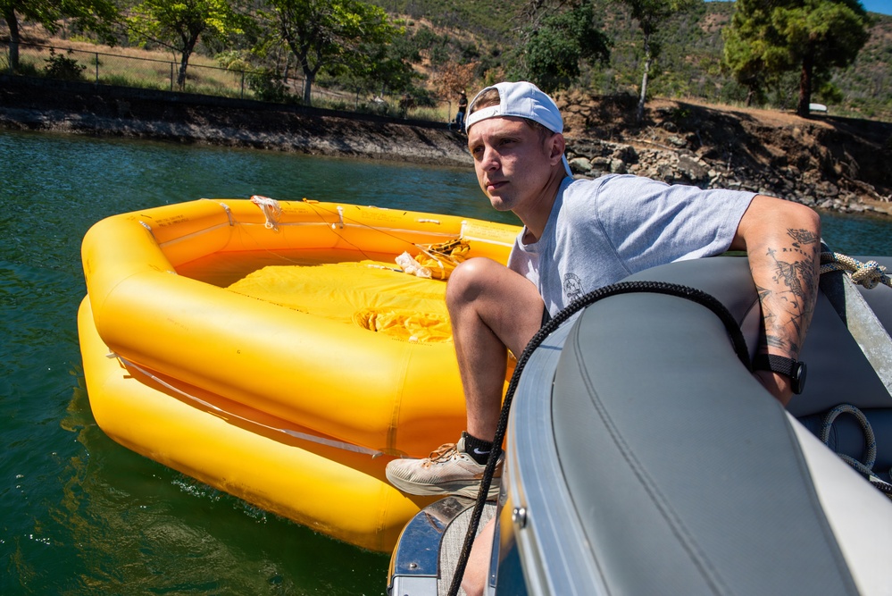 Travis Airmen complete water survival training at Lake Berryessa