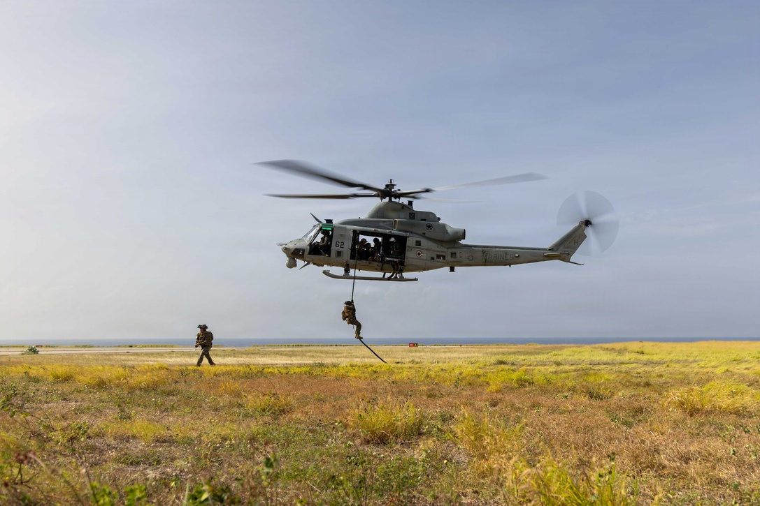U.S. Marines with Lima Company, 3rd Battalion, 2nd Marine Regiment, and Maritime Raid Force, both with Littoral Combat Force-24, conduct a long range fast-rope rehearsal from a UH-1Y Venom with Marine Medium Tiltrotor Squadron (VMM) 365 (Reinforced), LCF-24, at Naval Station Guantanamo Bay, Cuba, June 4, 2026. U.S. military forces are deployed to the U.S. Southern Command area of responsibility in support of Operation SOUTHERN SPEAR, Department of War-directed operations, and the president’s priorities to disrupt illicit drug trafficking, deter malign actors and protect the homeland through continuous presence. (U.S. Marine Corps photo)
