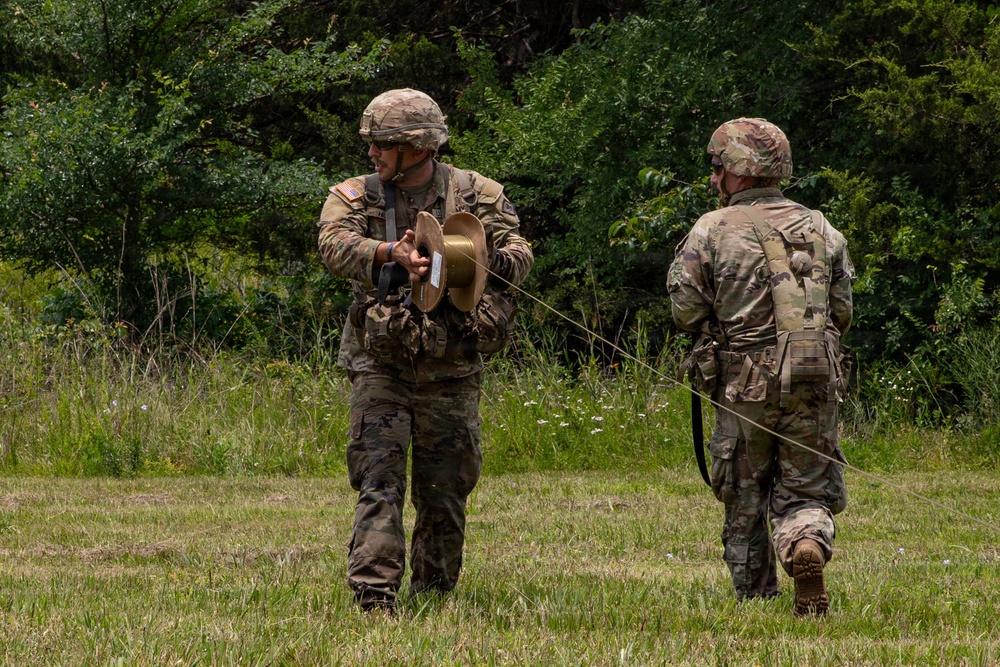 1036th Engineer Company simulate destroying enemy airfield.