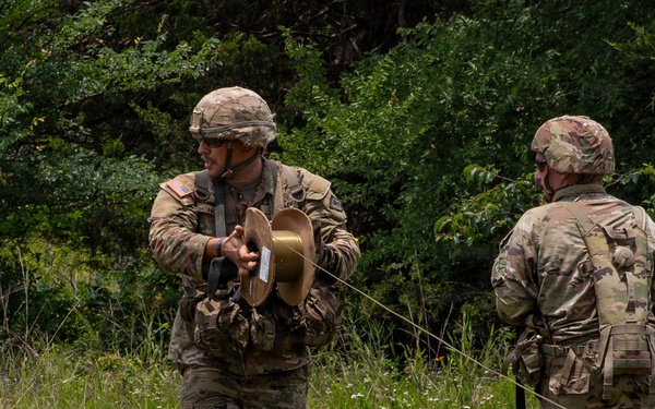 1036th Engineer Company simulate destroying enemy airfield.