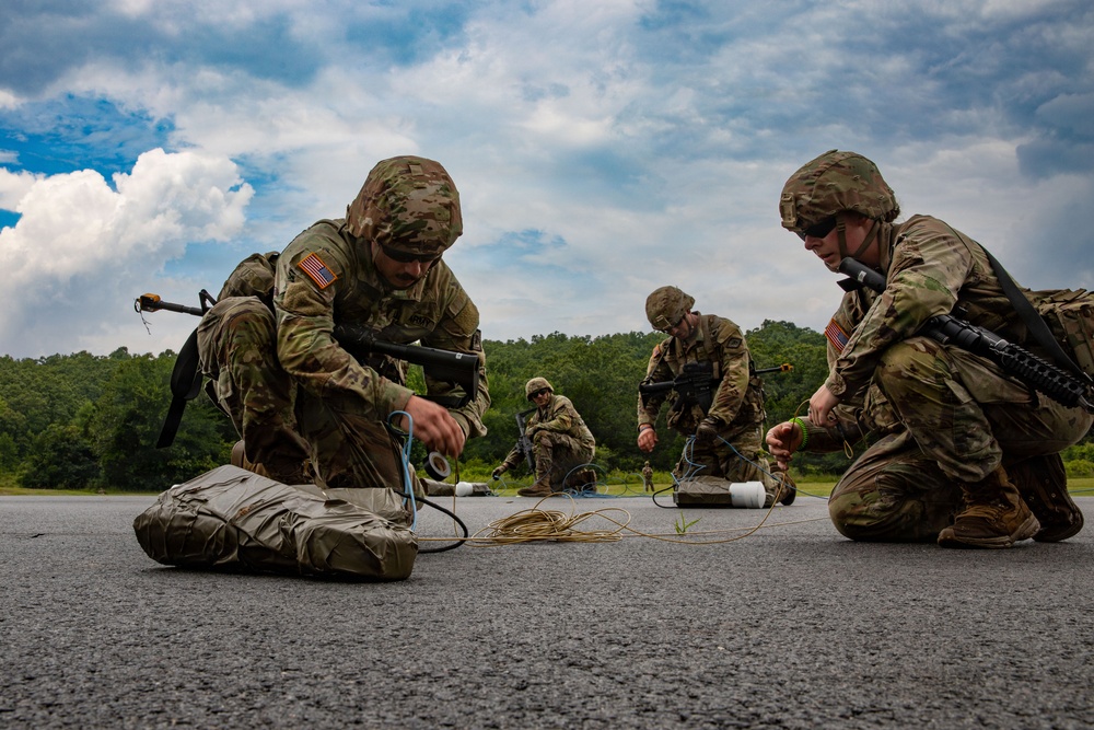 1036th Engineer Company simulate destroying enemy airfield.