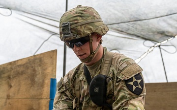 2CAB Soldier Conducts Weapons Training During E3B