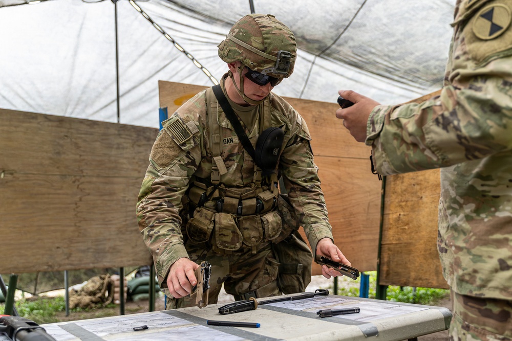 2CAB Soldier Conducts Weapons Training During E3B