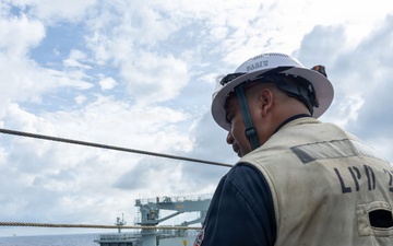 USS Portland Conducts Underway Replenishment with Motor Vessel Asterix