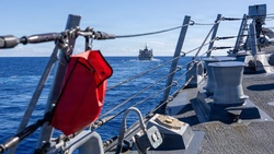 USS Mustin conducts a replenishment-at-sea with USNS Arctic [Image 7 of 15]
