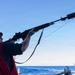 USS Mustin conducts a replenishment-at-sea with USNS Arctic