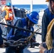 USS Mustin conducts a replenishment-at-sea with USNS Arctic