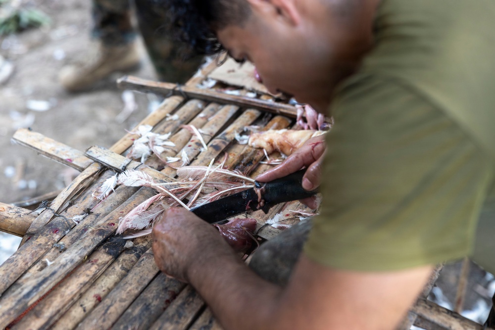 3rd Littoral Combat Team Marines participate in a jungle survival class