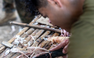 3rd Littoral Combat Team Marines participate in a jungle survival class