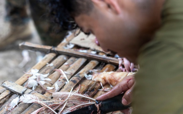 3rd Littoral Combat Team Marines participate in a jungle survival class