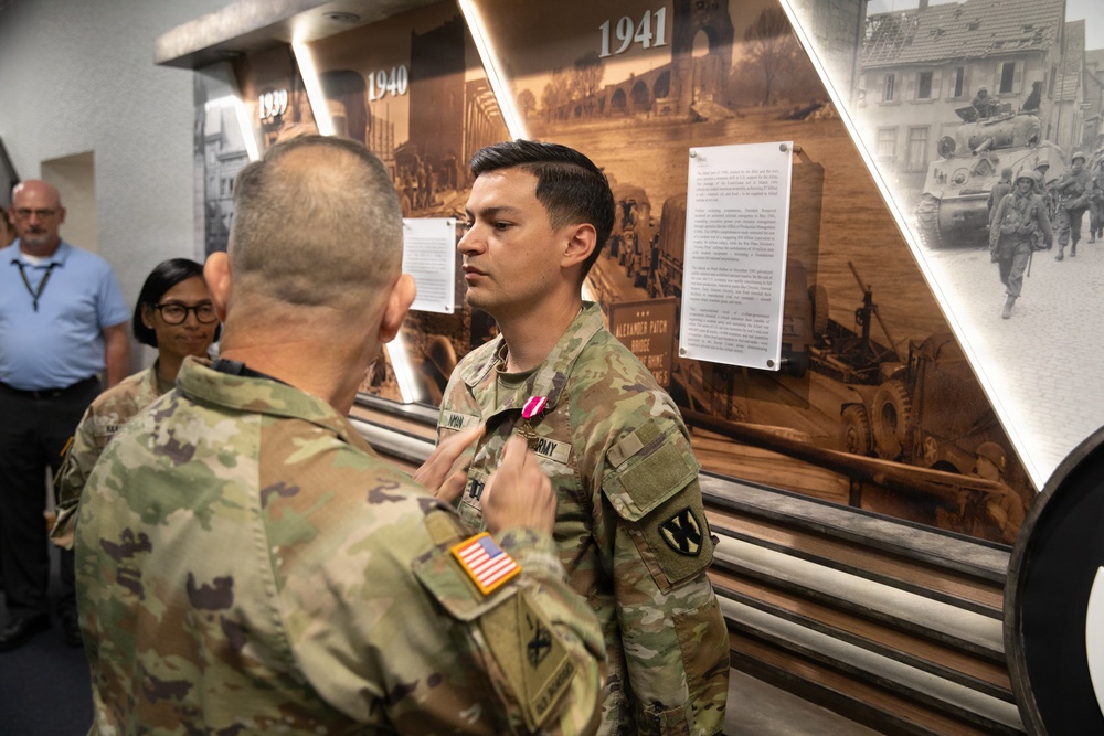 Captain Eric Inman receives a Meritorious Service Medal