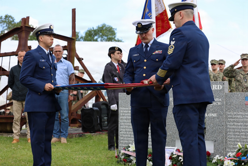 U.S. Coast Guard perform folding of the flag ceremony