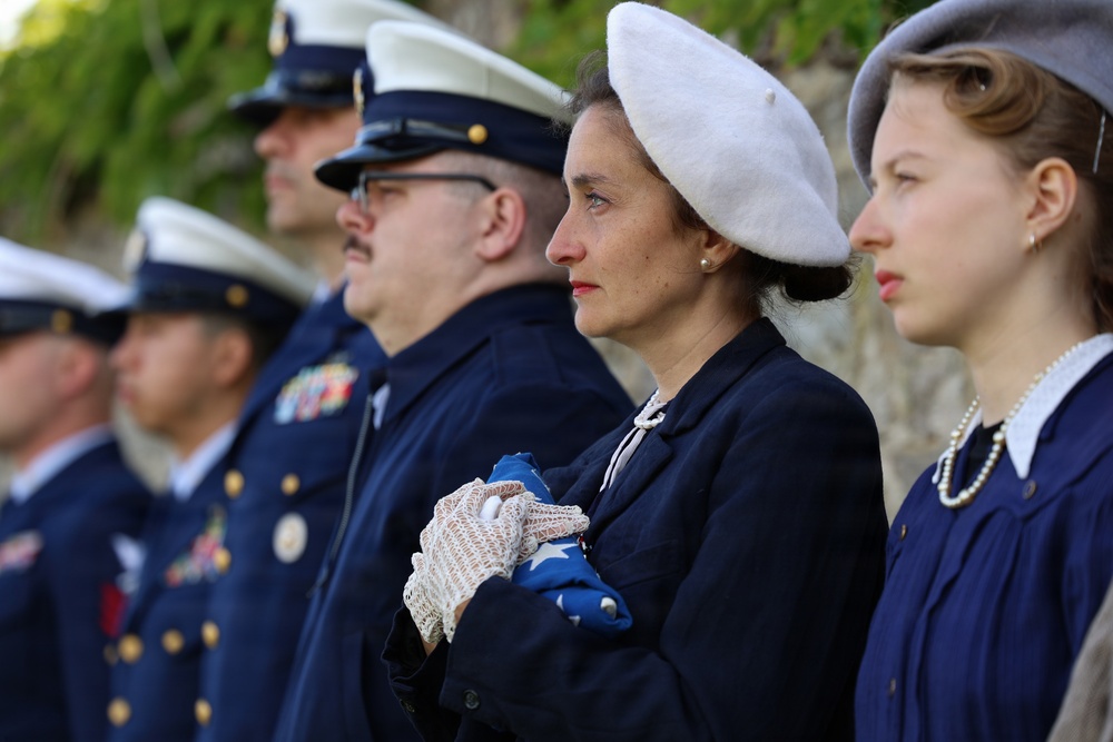 Representative for Jack Hamlin’s family, holding the folded flag to honor memory