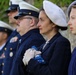 Representative for Jack Hamlin’s family, holding the folded flag to honor memory