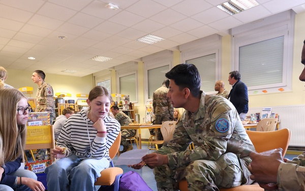 U.S. Soldiers speak to students of College Gambetta