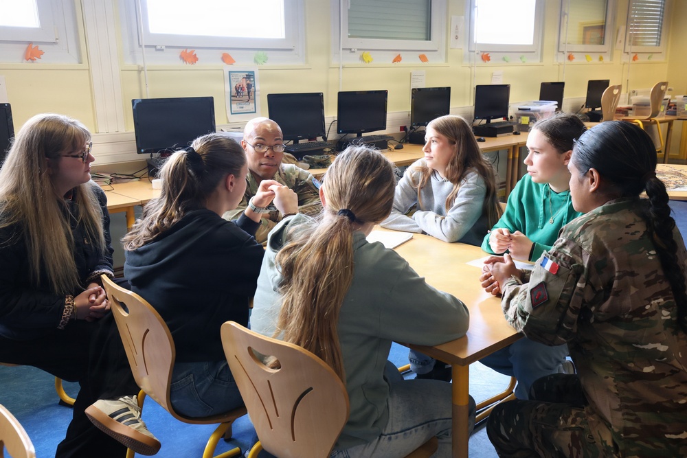 Students of College Gambetta asking questions to U.S. Soldiers
