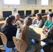 Students of College Gambetta asking questions to U.S. Soldiers