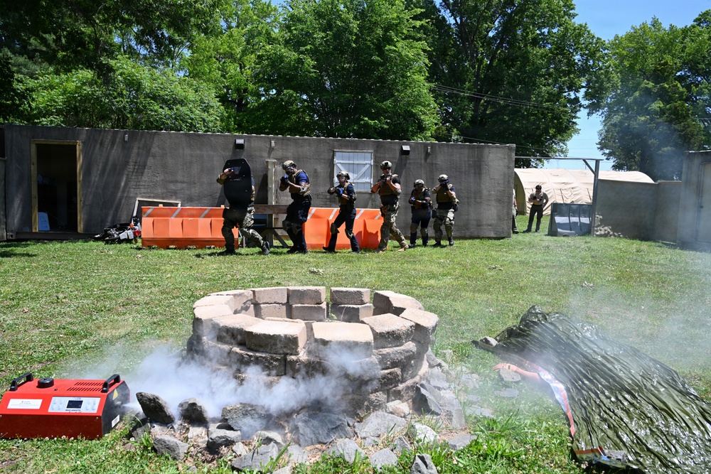 Philadelphia Police Medical Team Prepares Casualty for Evacuation at JB MDL