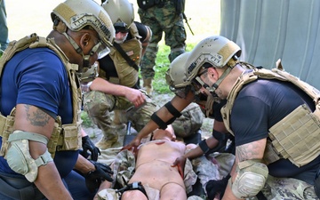 Philadelphia Police Medical Team Prepares Casualty for Evacuation at JB MDL