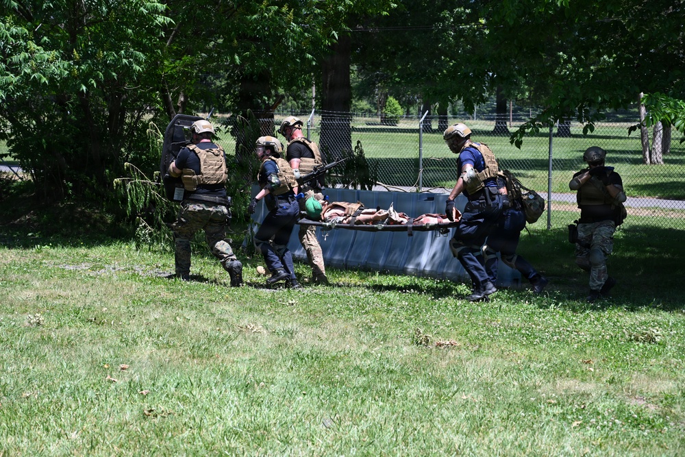 Philadelphia Police Medical Team Removes Injured Patient from Hostile Area at JB MDL