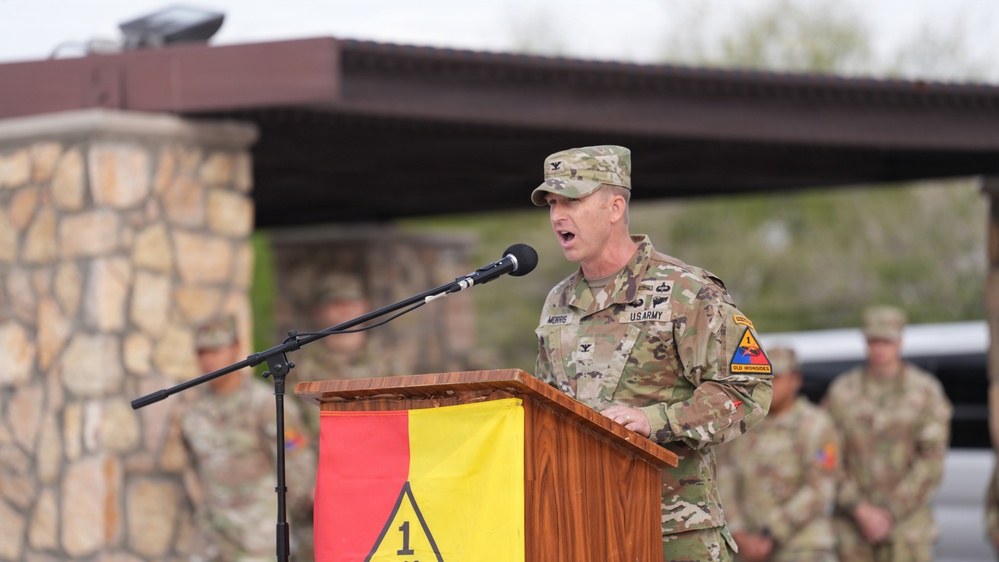 Col. George Morris delivers remarks as he assumes command