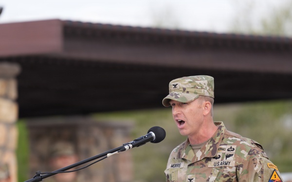 Col. George Morris delivers remarks as he assumes command